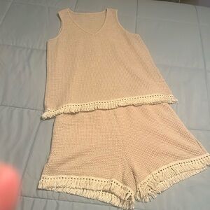 Tank top and matching shorts. Size Large. Worn once. Cream colored waffle print